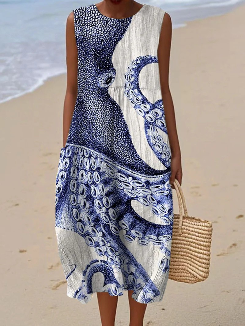 DELIA – STATEMENT SLEEVELESS DRESS